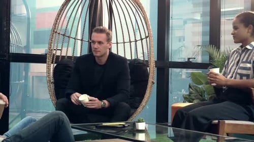 Office Worker Relax at Coffee Corner While Taking a Short Break From Work