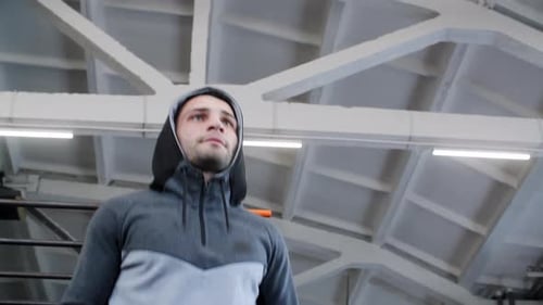 Man Jumping Rope in Indoor Gym