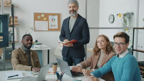 Portrait of Office Workers Creative Team in Modern Office Looking at Camera with Happy Faces
