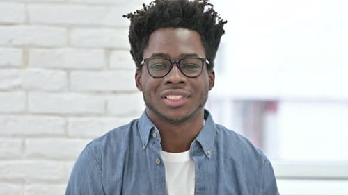 Smiling Young Adult Man in Glasses, Portrait