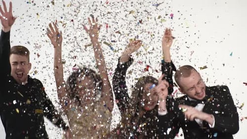 Friends Celebrate with Confetti Falling on Them