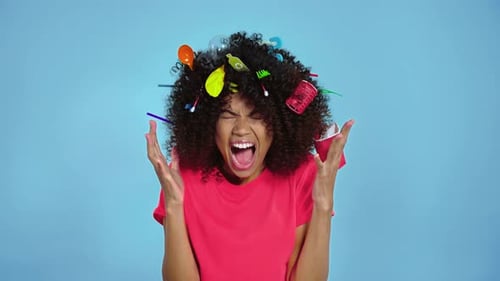 Woman with Plastic Objects in Hair Acts Mad