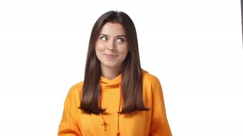 Smiling Young Woman in an Orange Hoodie