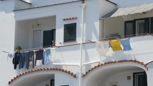 Laundry Drying on Clotheslines in Sunny City