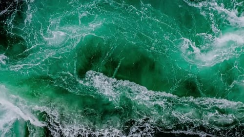 Waves of Water of the River and the Sea Meet Each Other During High Tide and Low Tide