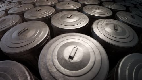 Steel trash bins stacked together in an endless loop lit by soft light. 4KHD