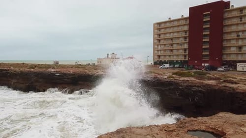 Splashes of Water From the Waves Breaking on the Stones
