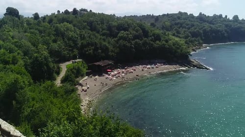 Sea beach, swimming people.