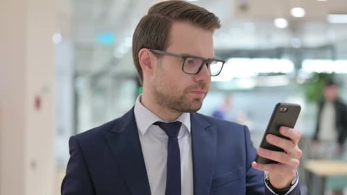 Man Reacts Negatively to Content on Mobile Phone