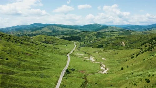 Aerial Drone Footage of Beautiful Landscape in Rural Area with Mountains