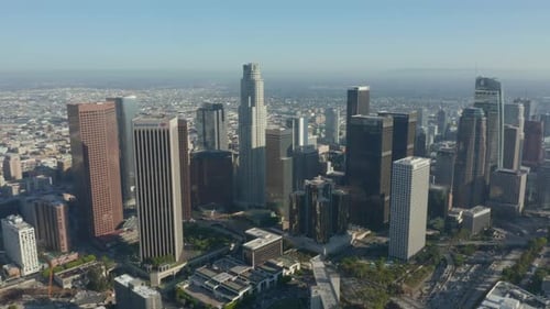 AERIAL: Wide View of Downtown Los Angeles, California Skyline at Beautiful Blue Sky and Sunny Day