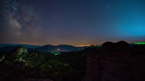 Milky Way galaxy, traffic lights, plane trails and meteor shower during Perseid Stream
