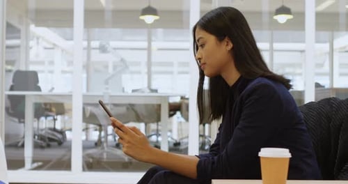 Businesswoman using digital tablet in office 4k