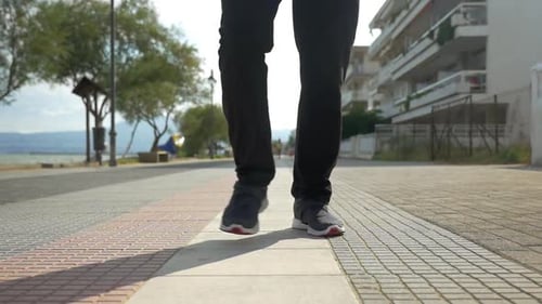 Man Starting To Run on the Seaside