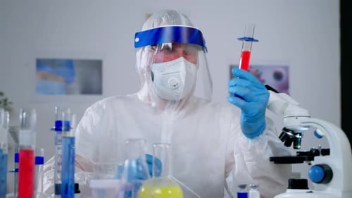 Scientist Holding Test Tube in a Lab