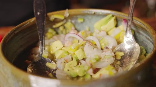 Chef preparing a delicious mix of veggie salad, vegan food, healthy eating concept.