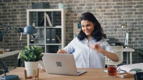Beautiful Young Lay Using Laptop in Office Then Resting Smiling Stretching Body