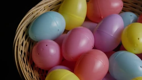 Basket Full of Colorful Plastic Easter Eggs