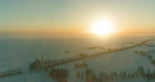 Aerial Drone View of Cold Winter Landscape with Arctic Field, Trees Covered with Frost Snow