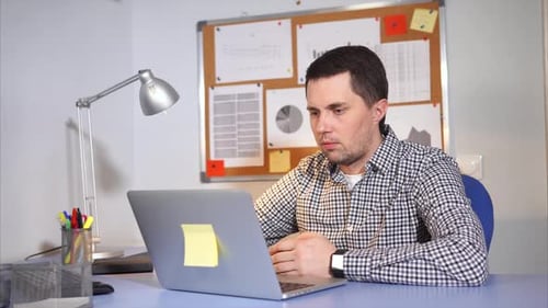 Office Worker Get Angry and Yelling on the Laptop in His Office.