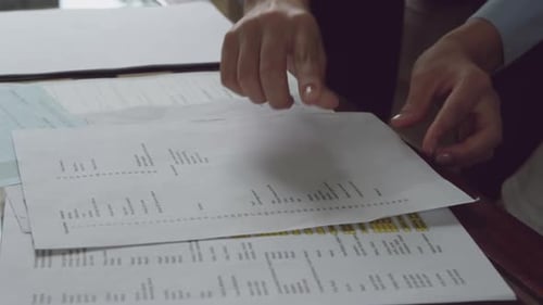 Senior man signing documents