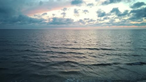 Sunrise Over the Sea. Colorful Sunset on the Baltic Sea, Latvia, Saulkrasti. Aerial Dron 4K Video