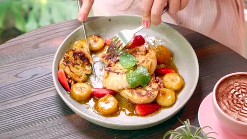 Breakfast in Cafe Woman Hand Cutting Piece of Sweet Caramel Toasted Bread