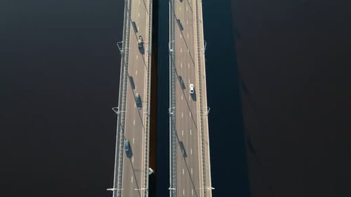 Aerial View of Bridge Over the River with Car Traffic in the City