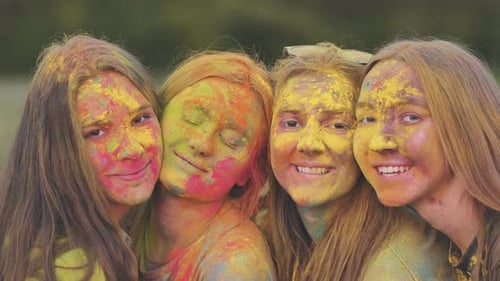 Happy Young Women Celebrate Holi Festival Together