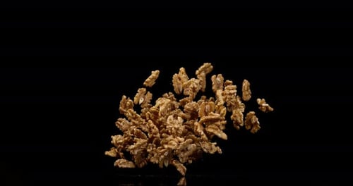 Pile of Shelled Walnuts Exploding Upward