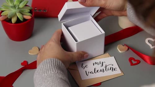 Romantic Gift Box Opened on Table