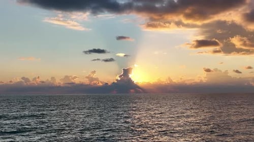 Cloudy sunset at sea aerial view 4 K