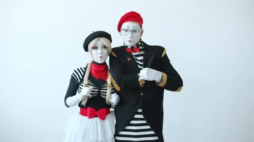 Pair of Mimes Performing Theatrical Walk