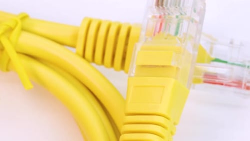 Macro Shot of Bright Yellow Ethernet Cables