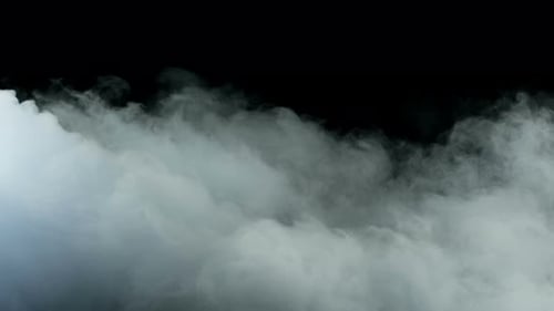 Wispy White Smoke Drifting on Black Background