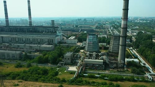 Huge Industrial Plant Area, Tall Exhaust Pipes and Large Storage Areas, Industrial Area of the City