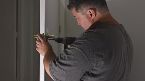 Builder is Installing Lock a Doot in the Room