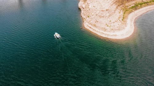 Fishing Boat Leading to Lake