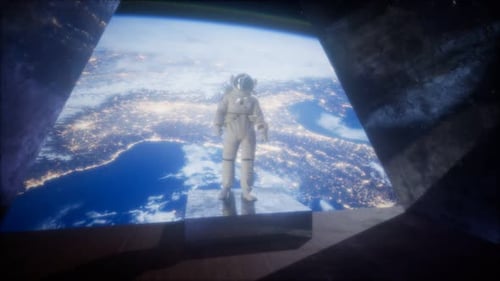 Astronaut on the Space Observatory Station Near Earth