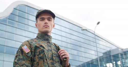 Young Adult Soldier in Uniform Standing Proudly