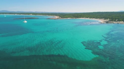 Transparent sea water near stony remote coast