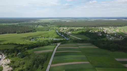 Scenic Aerial View of Rural Fields and River