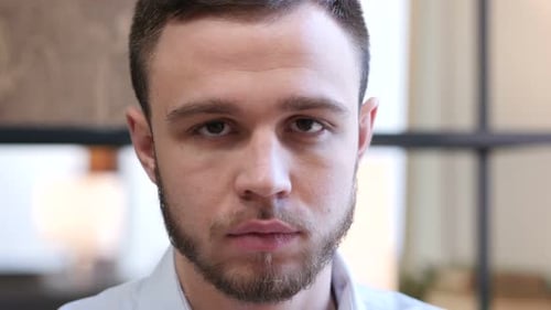 Close up of Serious Young Man