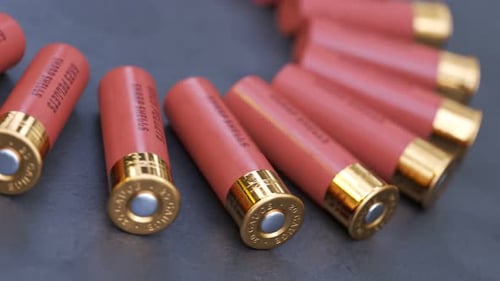 Animation with 20 gauge shotgun shells on a production line. Deadly ammo. Loop.