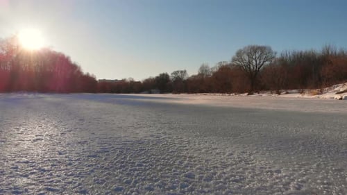 Flying Over Frozen River