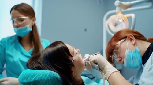 Woman visiting dentist. Dentist with female patient during oral checkup in dentistry