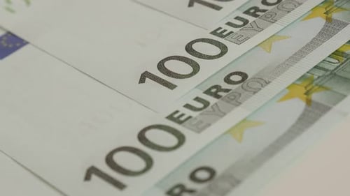 Denominations of 100 European Union paper currency slow pan 4K 2160p 30fps UltraHD footage - Panning