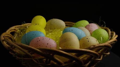 Pastel Easter Eggs in a Wicker Basket