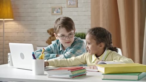 Children Learning on Laptop at Home