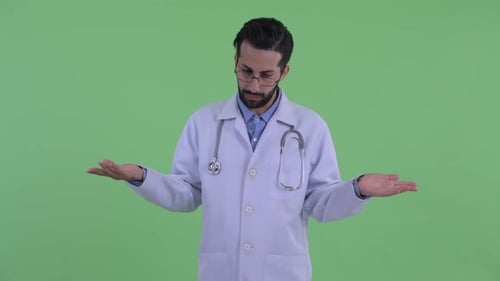 Man in Doctor's Coat Gesturing